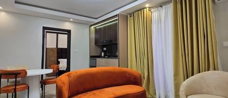 Superior suite, balkon, uitzicht op stad | Woonruimte