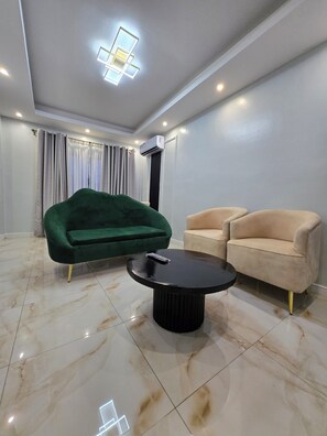 Superior Suite, Balcony, City View | Living area - SUNA'A HOME LOGPOM (Douala)