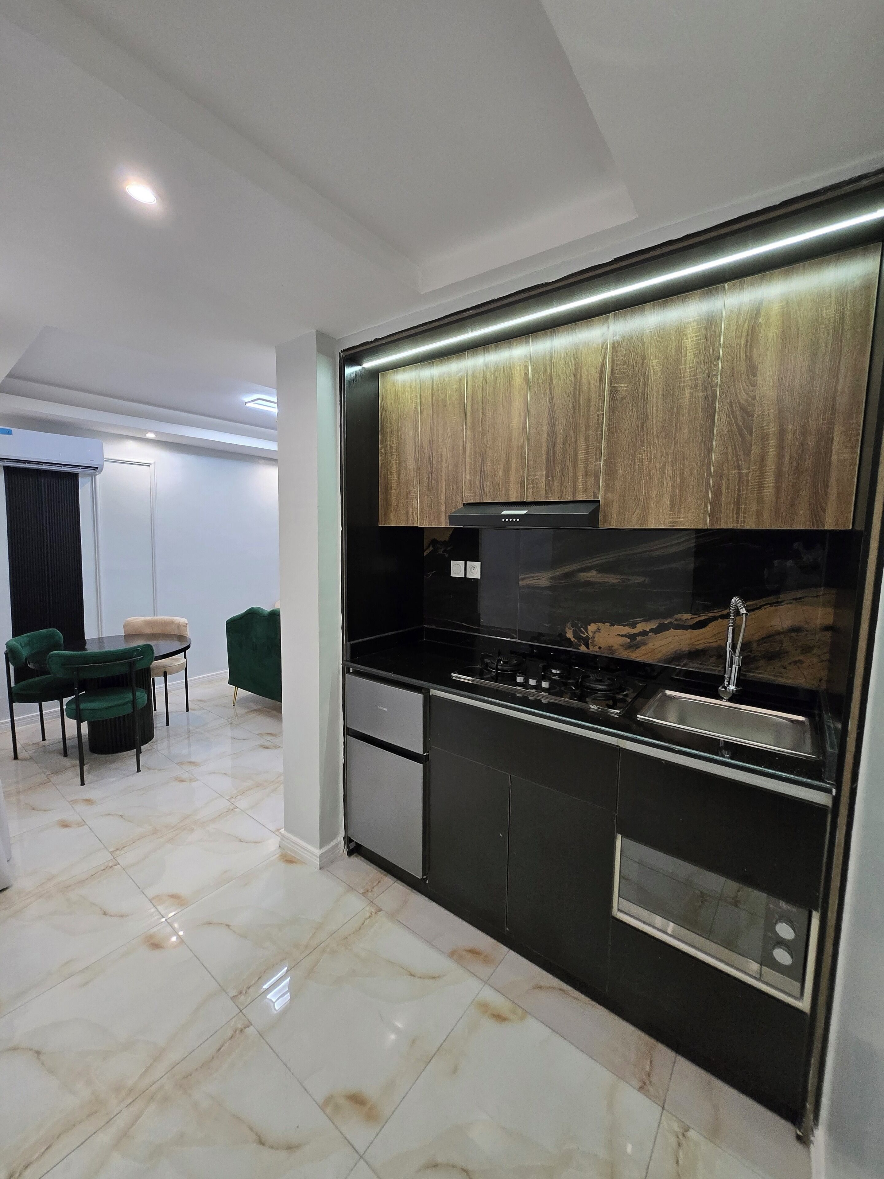 Suite superior, balcó, vistes a la ciutat | Cuina privada