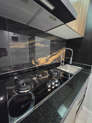 Superior suite, balkon, uitzicht op de stad | Privékeuken