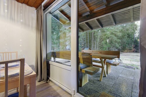 Ferienhaus 'Am Neubäuer See' mit privater Terrasse, Gemeinschaftsgarten und WLAN