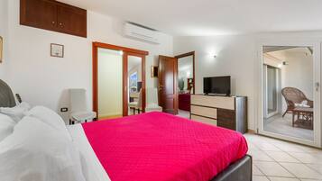 2 habitaciones, tabla de planchar con plancha y ropa de cama