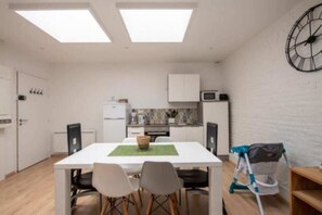 Fridge, microwave, highchair, dining tables
