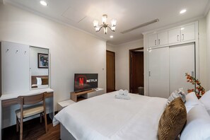 Condo, 2 Bedrooms, City View, Poolside | Desk, laptop workspace, blackout drapes, iron/ironing board