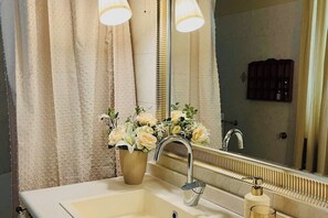 Hair dryer, bidet, towels, soap