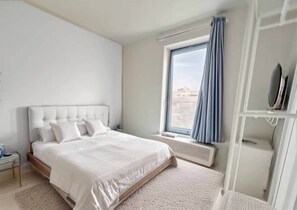 1 slaapkamer, een strijkplank/strijkijzer, wifi, beddengoed