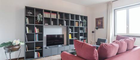 Apartment (2 Bedrooms) | Living area | 32-inch TV with cable channels
