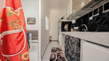 Apartamento, vista para a cidade | Cozinha privada