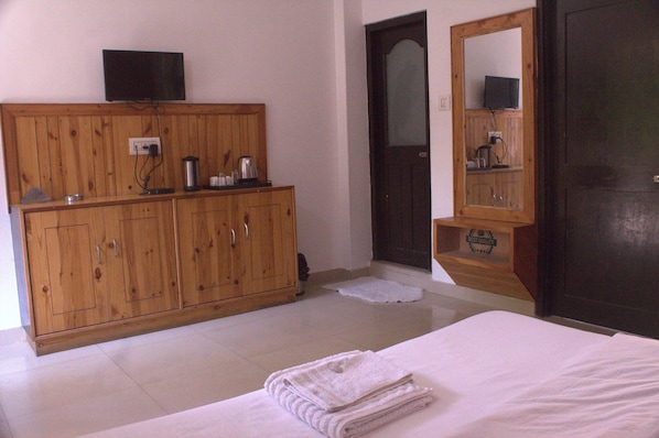 Desk, laptop workspace, blackout curtains, free WiFi