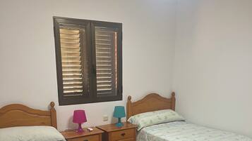 4 dormitorios, tabla de planchar con plancha, wifi y ropa de cama