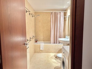 Hair dryer, towels, soap, shampoo