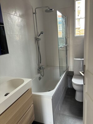 Hair dryer, towels, soap, toilet paper