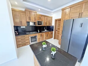 Fridge, microwave, coffee/tea maker, toaster