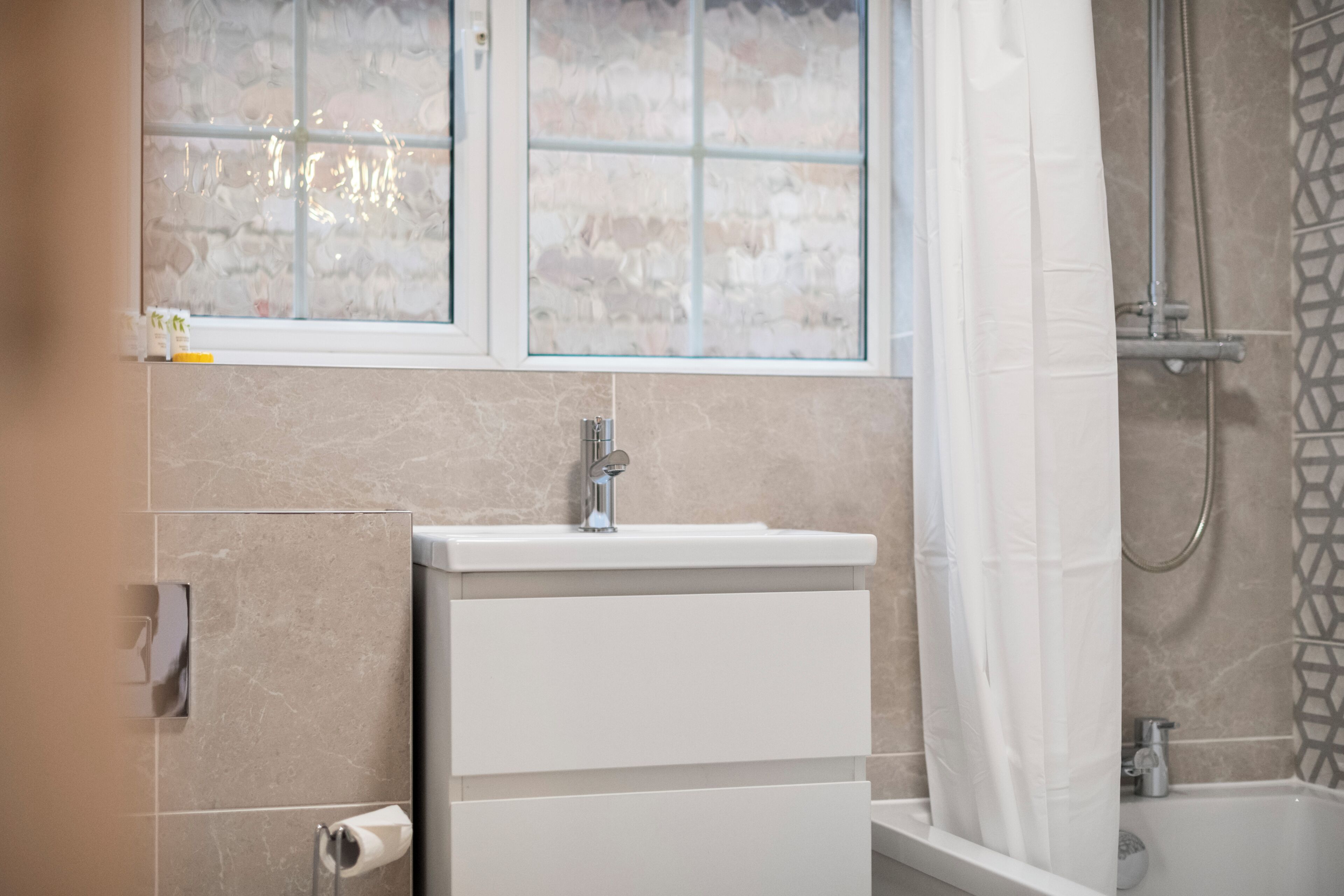 Hair dryer, towels, soap, toilet paper