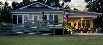 New lakefront 4 bedroom, 2 bath house on Lake Moultrie with dock sleeps 10