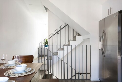 Enjoy Stylish 4BR Townhouse, Sleeps 9 with Wi-Fi