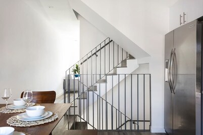 Enjoy Stylish 4BR Townhouse, Sleeps 9 with Wi-Fi