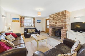 TV, fireplace, books, offices