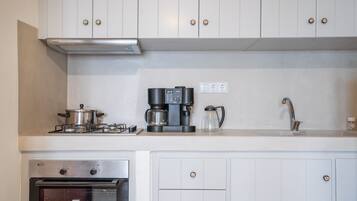 Microwave, oven, coffee/tea maker, cookware/dishes/utensils