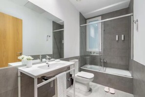 Hair dryer, bidet, towels, soap