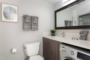 Shower, hair dryer, towels