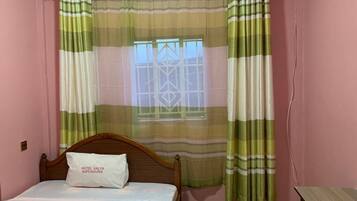 Quarto solteiro standard | Wi-Fi de cortesia, roupa de cama