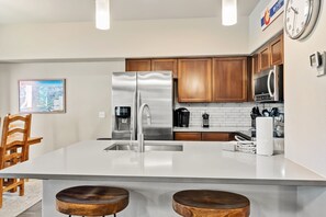 Microwave, stovetop, dishwasher, coffee/tea maker