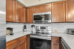 Microwave, stovetop, dishwasher, coffee/tea maker