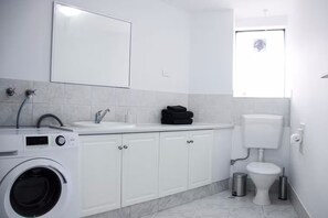 Shower, hair dryer, towels, soap