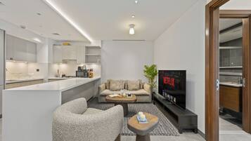 Deluxe Apartment, Balcony, City View | Living room