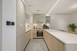 Deluxe Apartment, Balcony, City View | Private kitchen