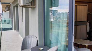 Deluxe Apartment, Balcony, Partial Sea View | Terrace/patio