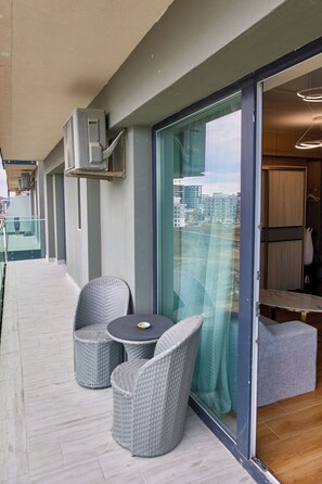 Deluxe Apartment, Balcony, Partial Sea View | Terrace/patio