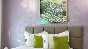 Deluxe Apartment, Balcony, Partial Sea View | Individually decorated, individually furnished, free WiFi, bed sheets