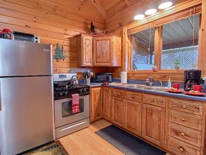 Fridge, stovetop, coffee/tea maker, electric kettle