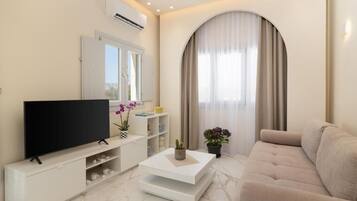 Deluxe appartement, 1 slaapkamer, balkon, uitzicht op de stad | Woonruimte