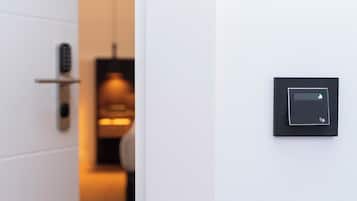 Junior suite | Luxe beddengoed, donzen dekbedden, Select Comfort-bedden, een minibar