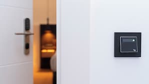 Junior suite | Luxe beddengoed, donzen dekbedden, Select Comfort-bedden, een minibar
