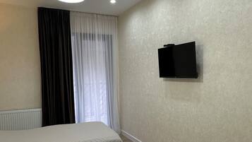 2 chambres, fer et planche à repasser, Wi-Fi, draps fournis