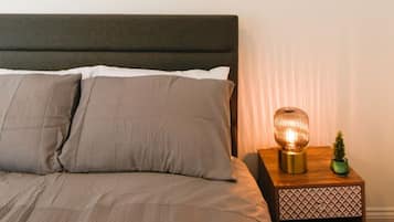 1 bedroom, desk, iron/ironing board, travel crib