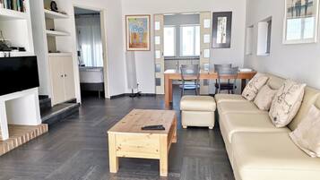 Apartment, 2 Bedrooms, Balcony, Sea View | Living area | 50-inch LCD TV with satellite channels