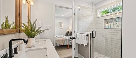 Shower, hair dryer, towels, soap