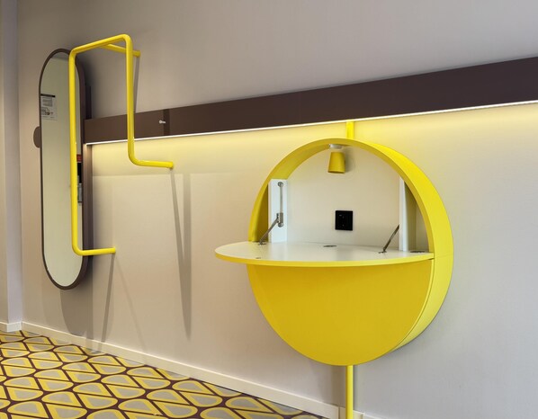 Hypo-allergenic bedding, desk, laptop workspace, blackout drapes