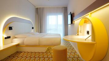 Hypo-allergenic bedding, desk, laptop workspace, blackout curtains