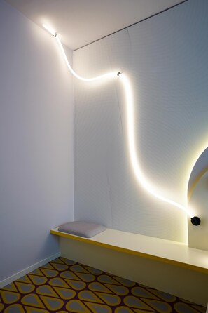 Hypo-allergenic bedding, desk, laptop workspace, blackout curtains