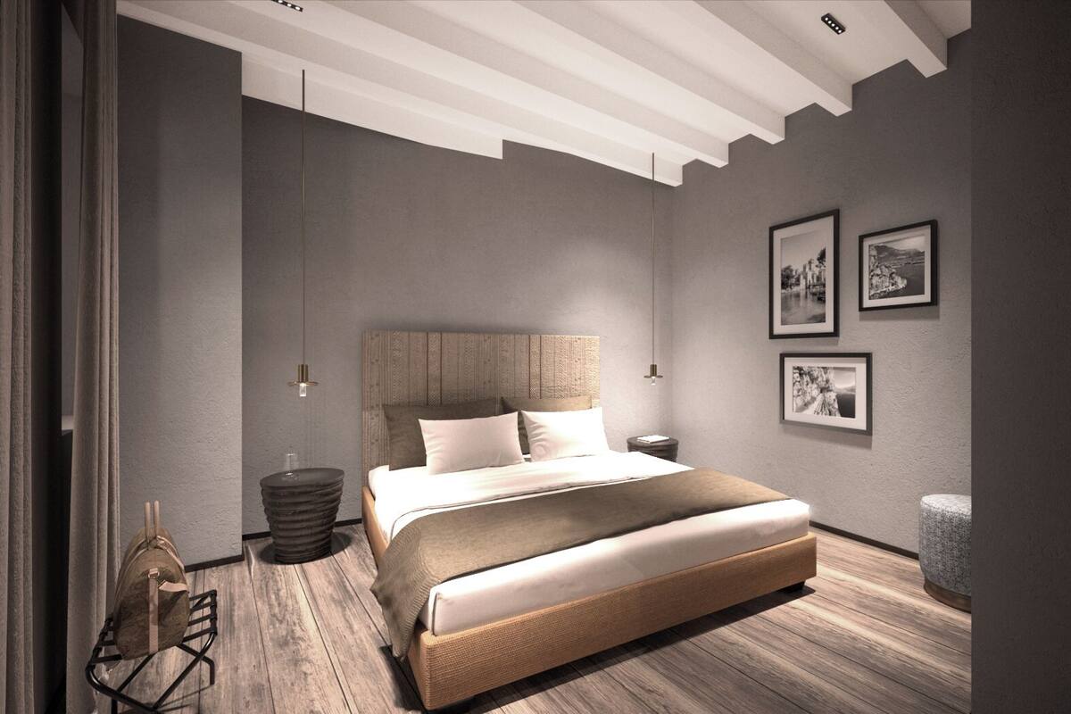 Exclusive Suite, Partial Lake View | In-room safe, desk, laptop workspace, blackout drapes
