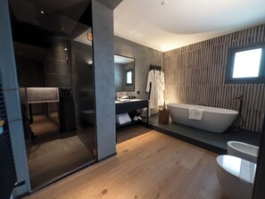 Exclusive Suite, Partial Lake View | Bathroom | Hair dryer, slippers, towels, soap