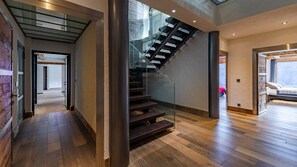 64-inch flat-screen TV with satellite channels, fireplace