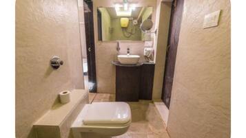 Shower, jetted tub, hair dryer, towels