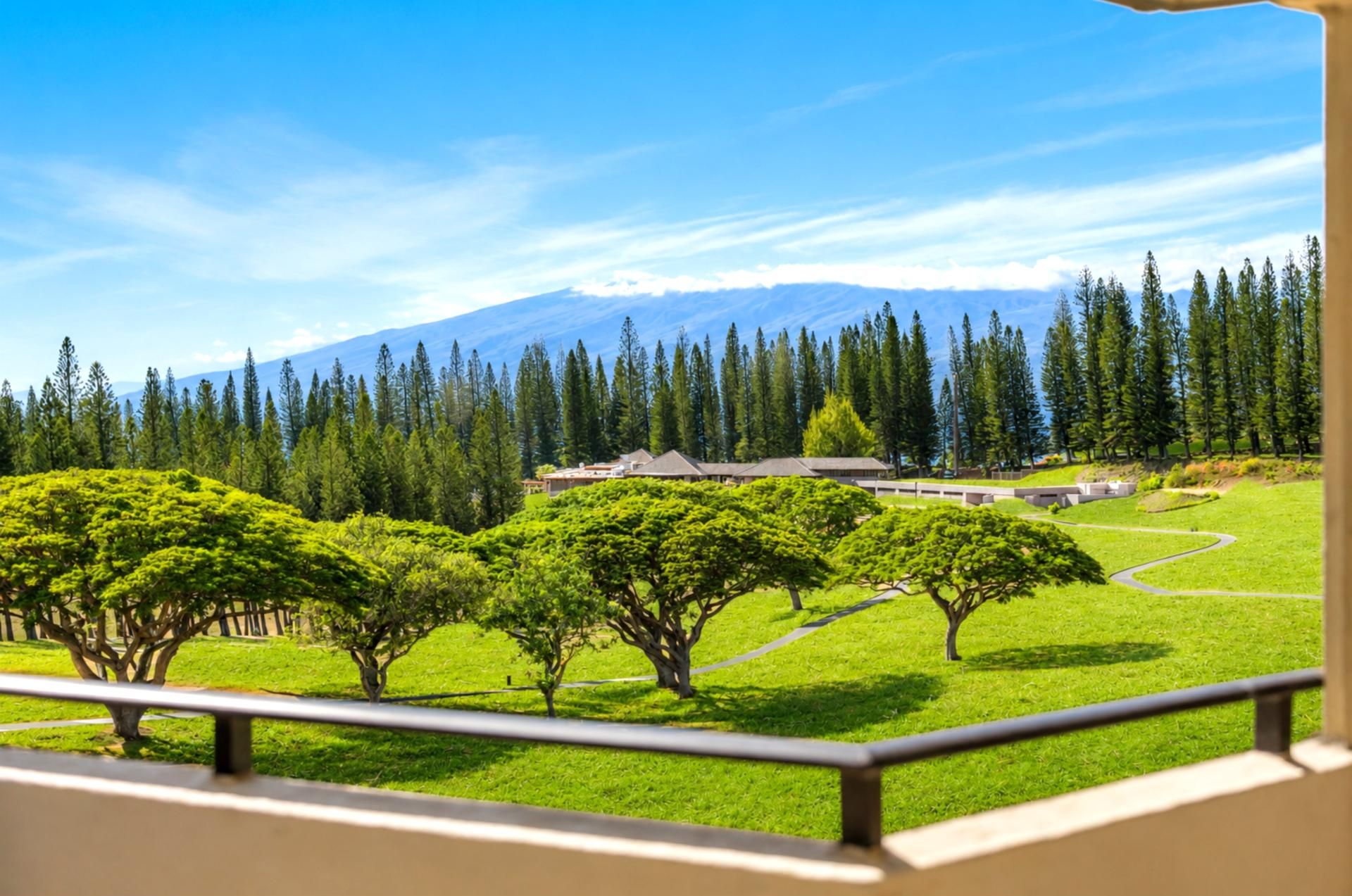 Open green fairways and a glimpse of the ocean and mountains set the tone for your stay at Kapalua Golf Villas.